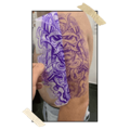 Satisfied customers showcasing their tattoos created using Tattoo Art Set Procreate tools.