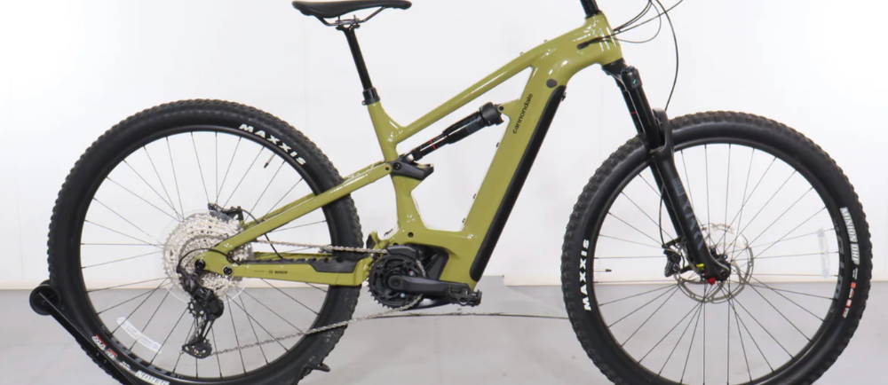 A lime green Cannondale Moterra Neo 3 full suspension electric mountain bike
