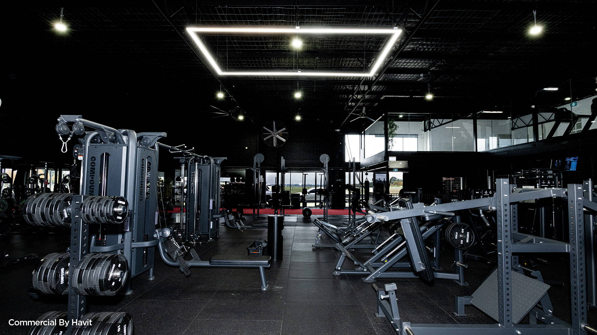 LED Custom made Pendant by Havit Commerical, illuminating the interior of a gym. 