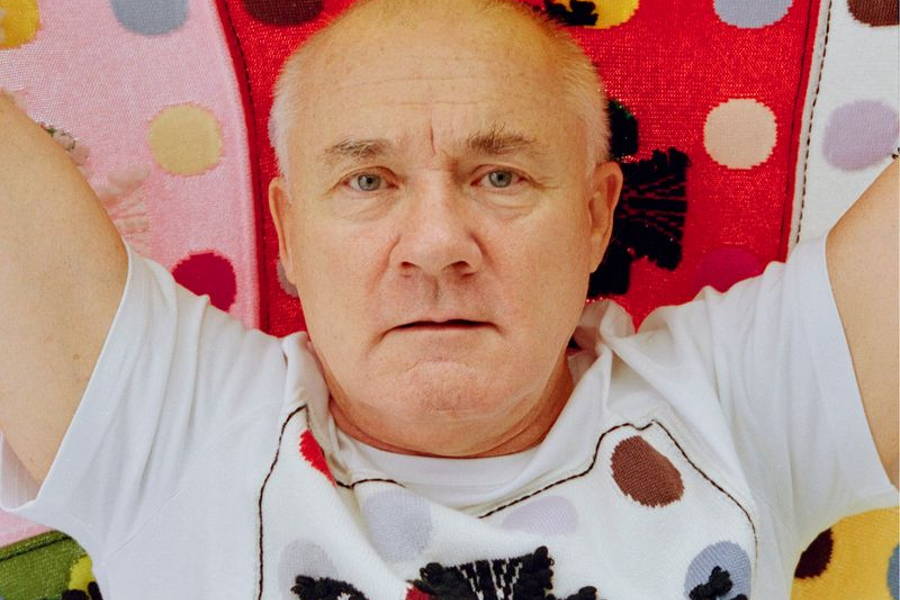 Image may contain: Damien Hirst, Clothing, T-Shirt, Face, Head, Person, Photography, Portrait, Cushion, Home Decor, and Baby