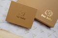 Two premium gift boxes embossed with the Baa Baby logo in gold