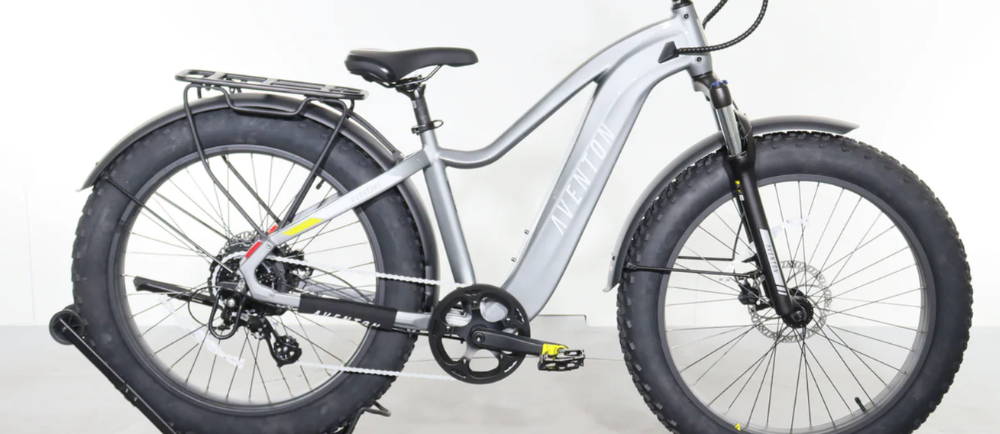 A white Aventon Aventure fat tire electric bike