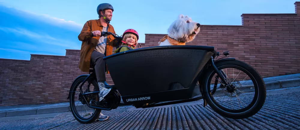 Father with child and dog on Urban Arrow electric cargo bike