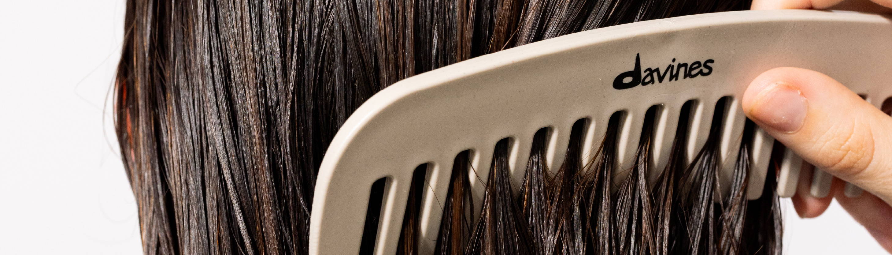 Davines comb brushing through hair