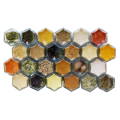 A group of hexagonal spice jars arranged in a rectangle pattern