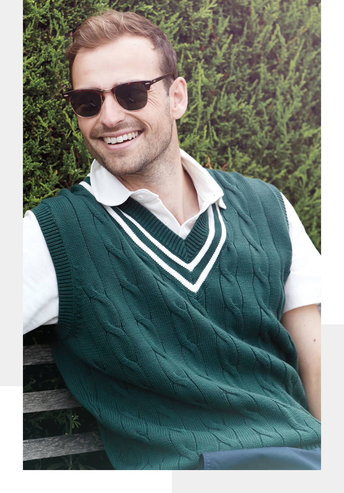 Model wearing the Alan Paine cricket sweater in colourway ecru with a claret trim.