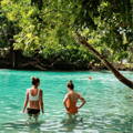 two girls swimming in the blue lagoon