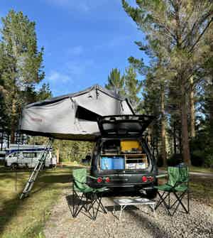 Self contained car with rooftop tent