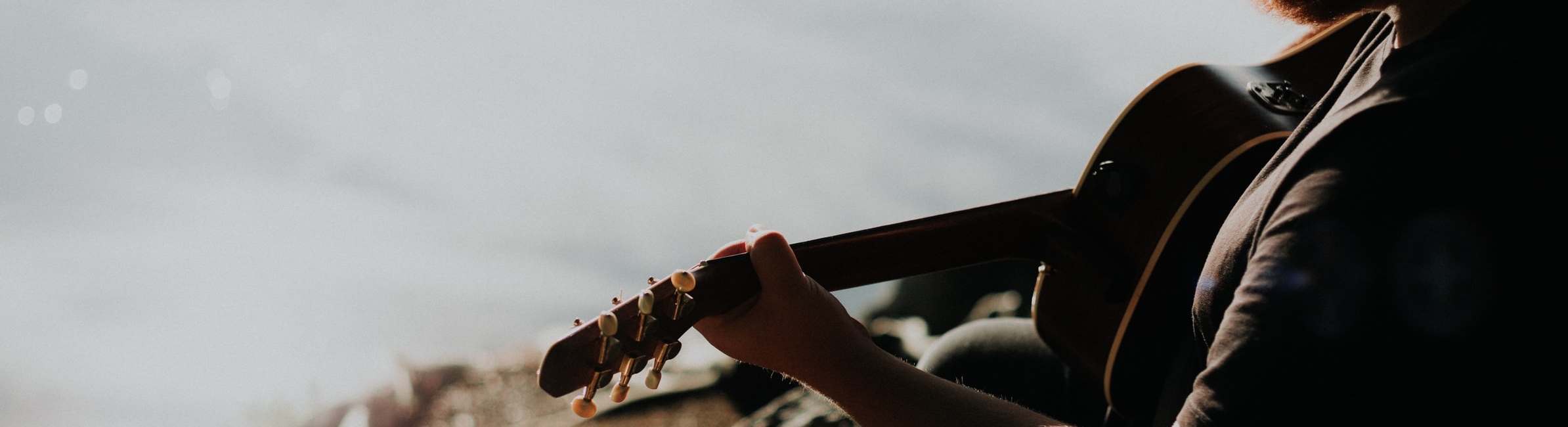 man playing guitar