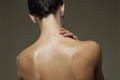 a close up of a woman's back skin