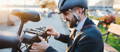 Man changing electric bike battery