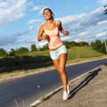 female-running-alone-desolate-road