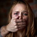 female-being-silenced-by-attacker-hand-over-mouth