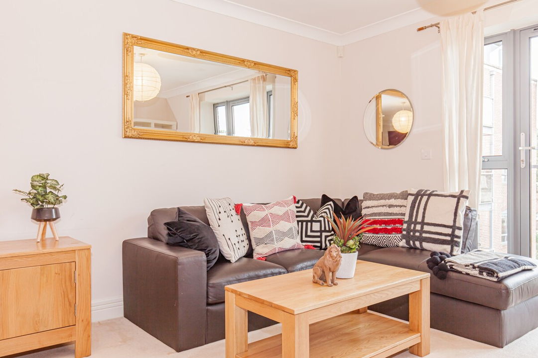 Living room with L shaped sofa and coffee table