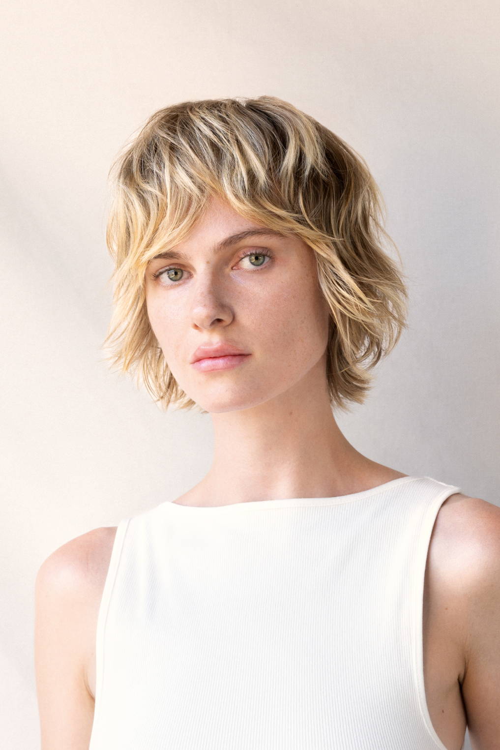 woman with a blonde bob haircut