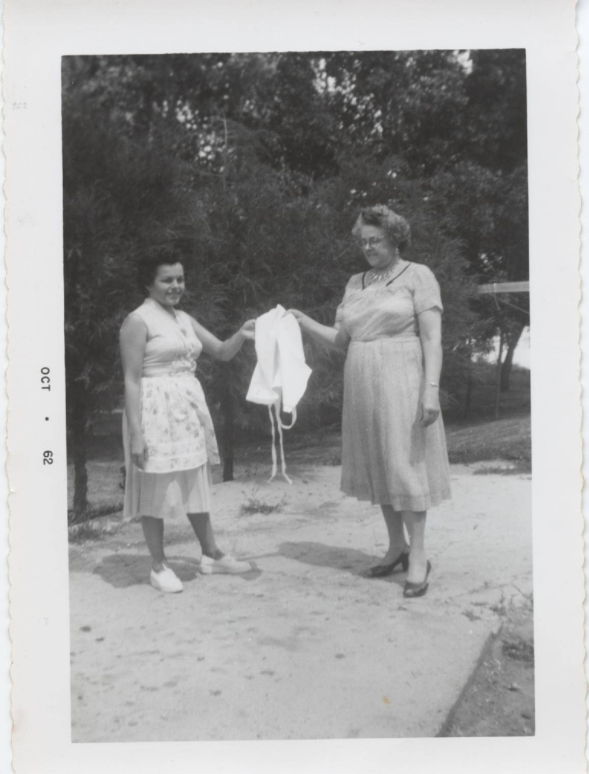 Grandma Izzy and Great Grandma Clara passing down the apron strings for Appleton's Market - great strong women leading the way 