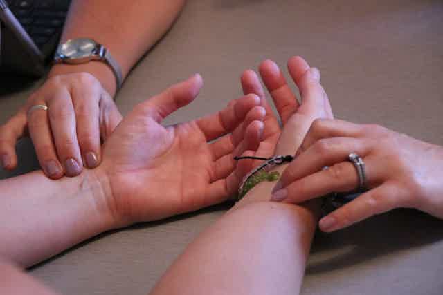 Dr. Roesner checking her patient
