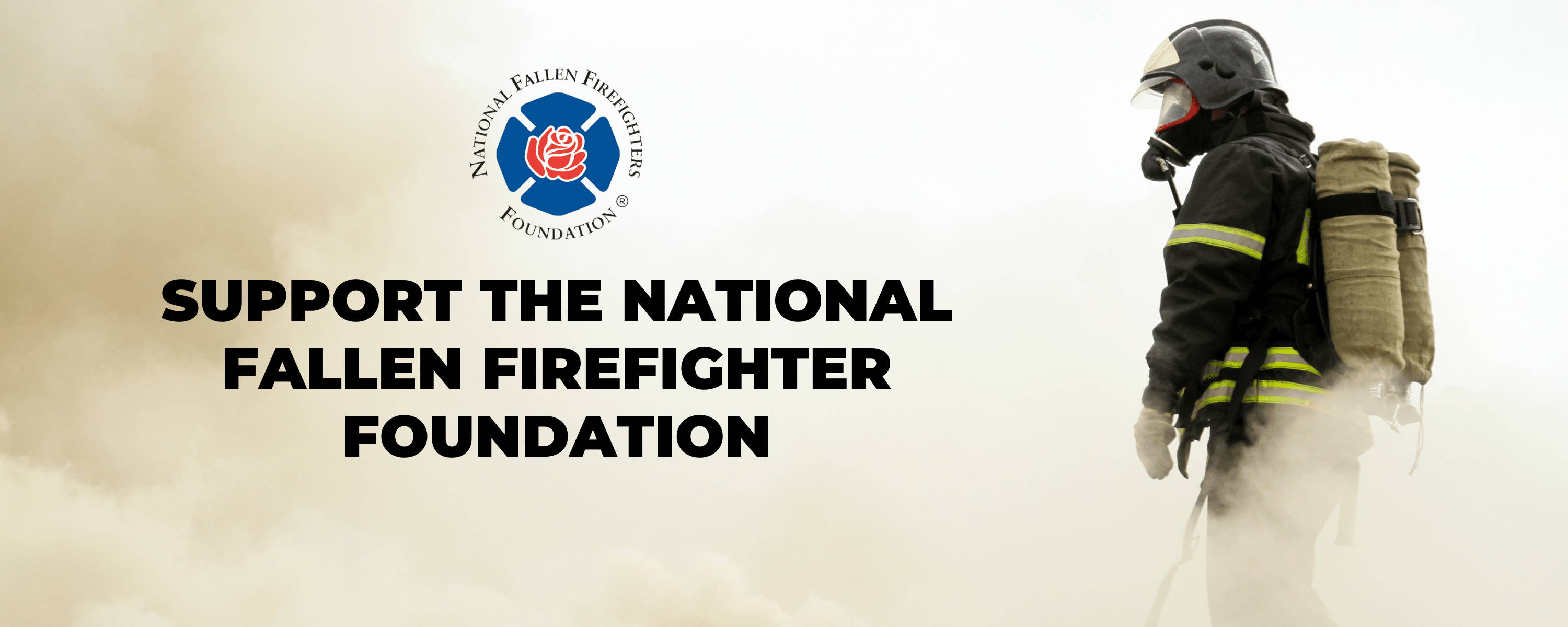 Fire fighter fighting a fire in uniform