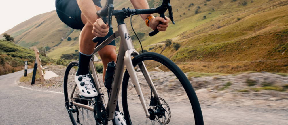 Rider on lightweight La Pierre road electric bike