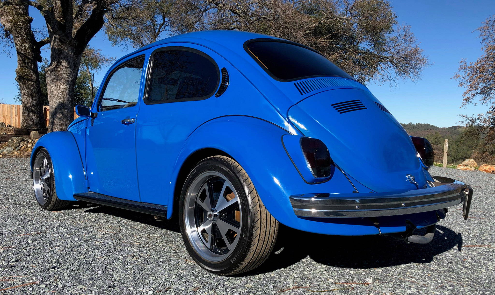 blue volkswagen beetle on all black machined klassik rader 914 wheels