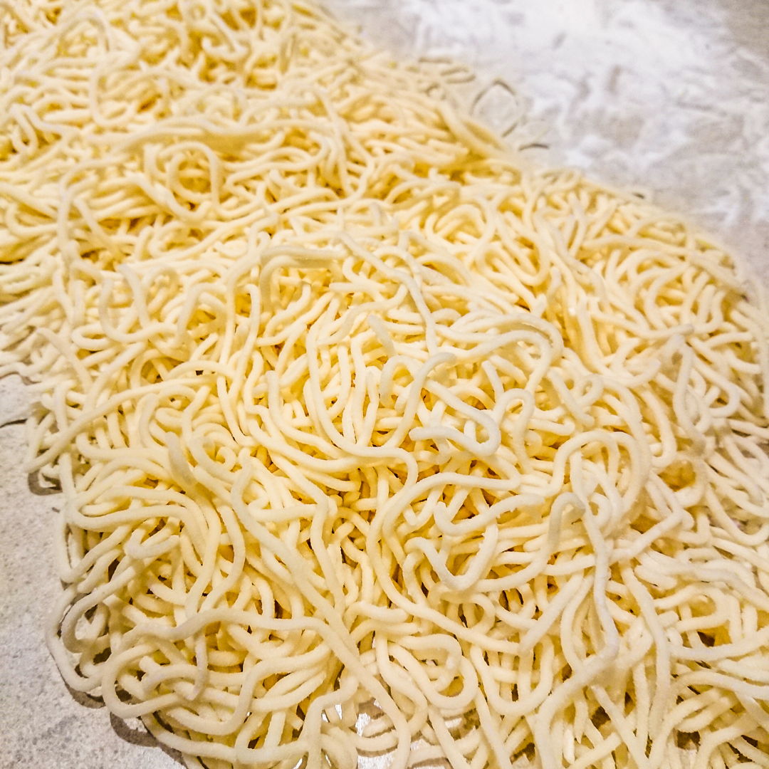 Noodles for our Taiwanese Spicy Beef Noodle Soup.  I used a hand operated pasta machine to roll and cut these noodles.