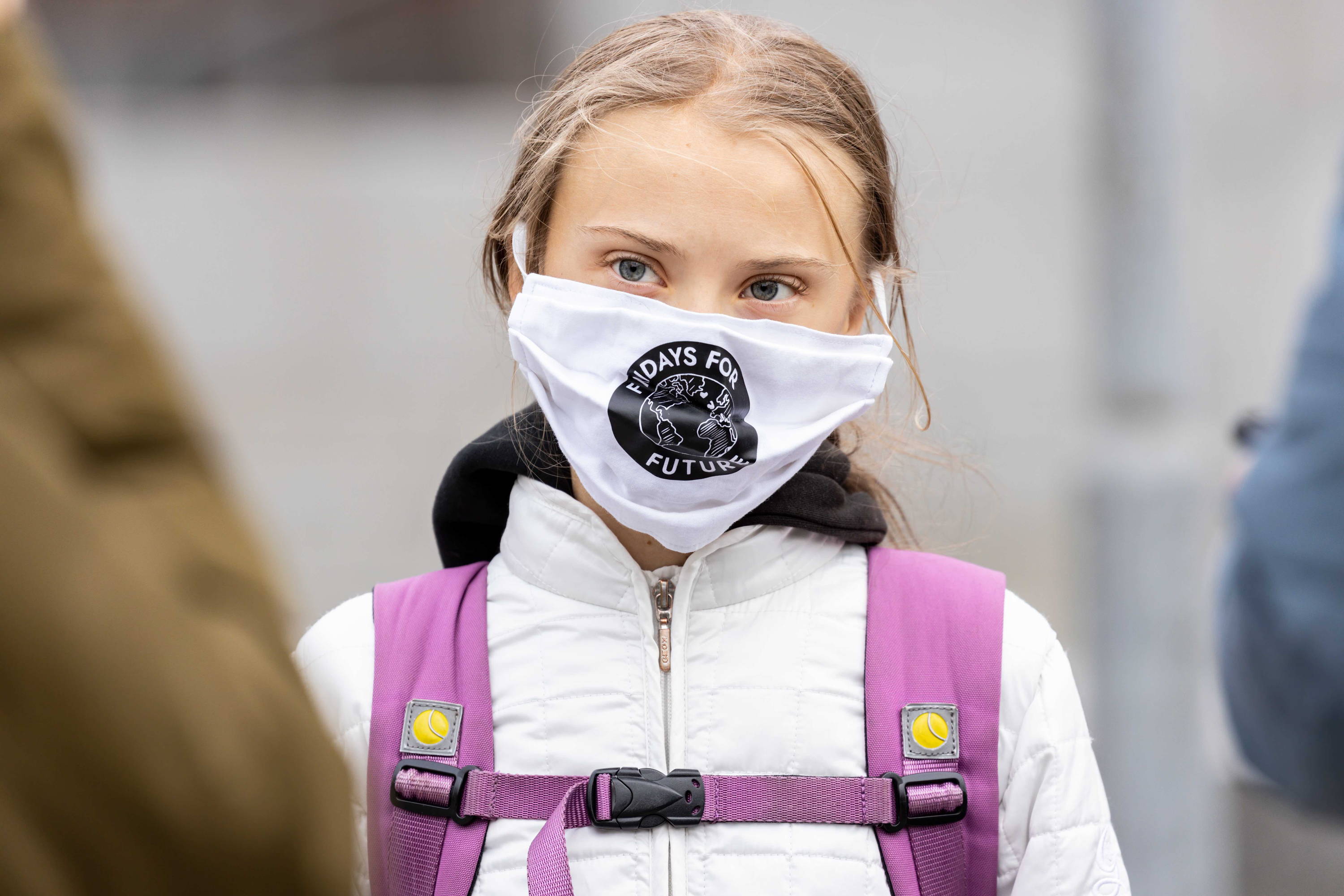 Greta Thunberg wearing a mask