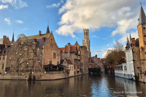 Bruges Private Tour from Paris with Champagne & Canal Cruise