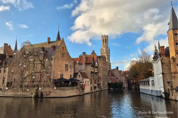 Bruges Private Tour from Paris with Champagne & Canal Cruise