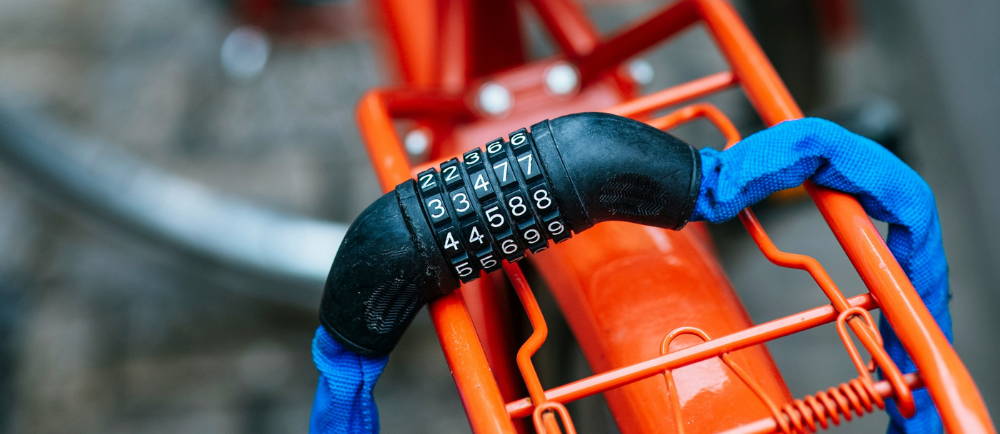 Bike with combination lock around rear rack