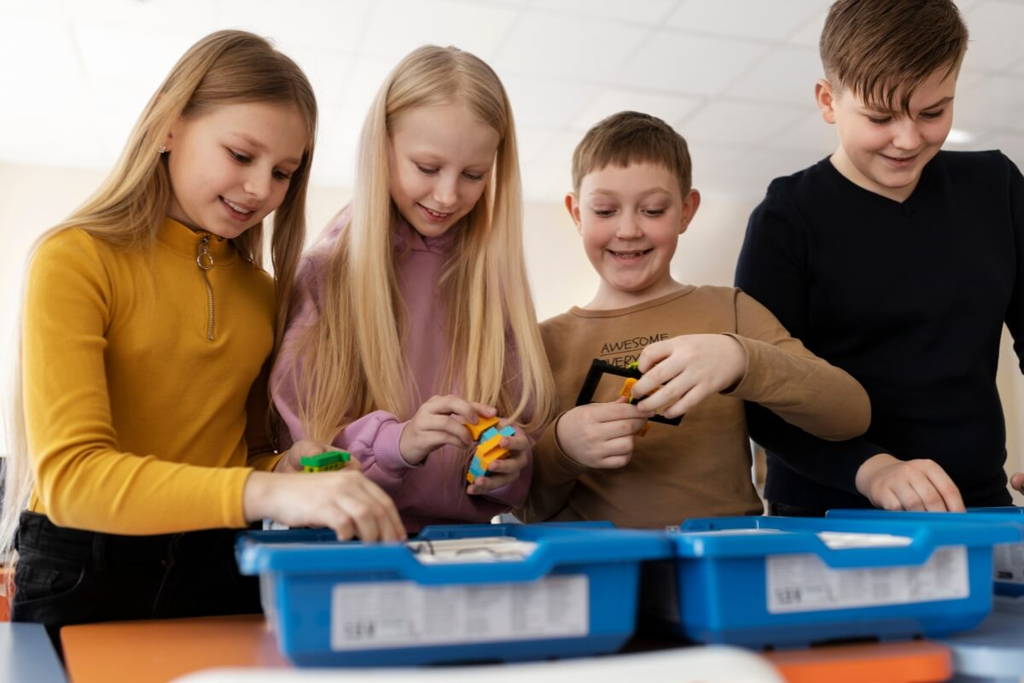 Group of children playing and sorting things together, fostering social interaction.