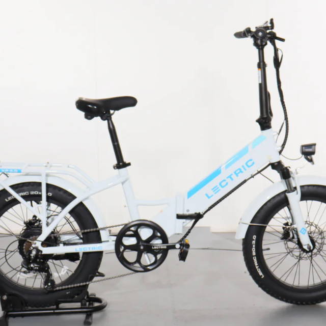 a white Lectric XP 3.0 Long-Range electric folding bike