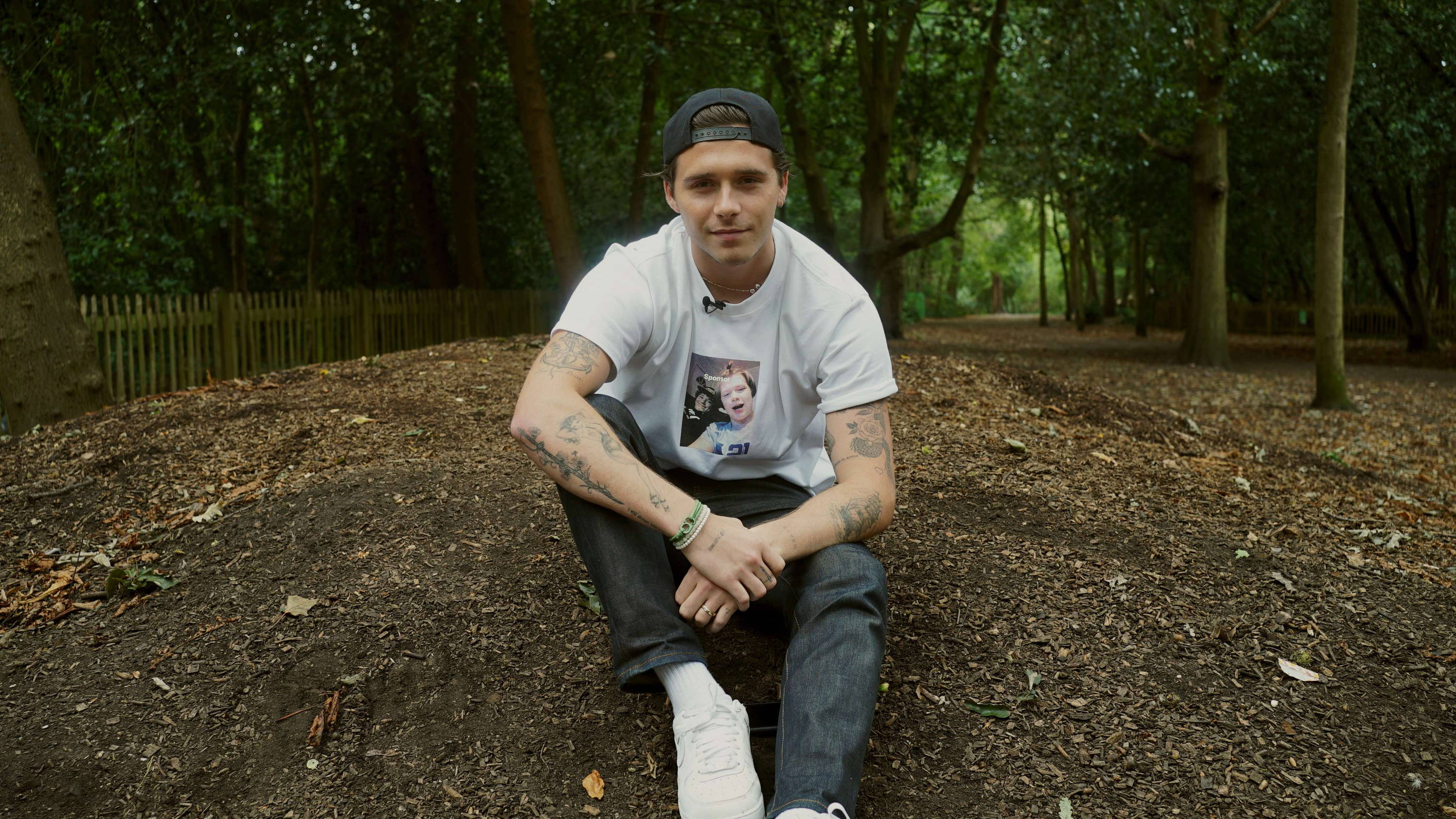 Brooklyn Beckham wears a Goal 13: Climate Action #TOGETHERBAND