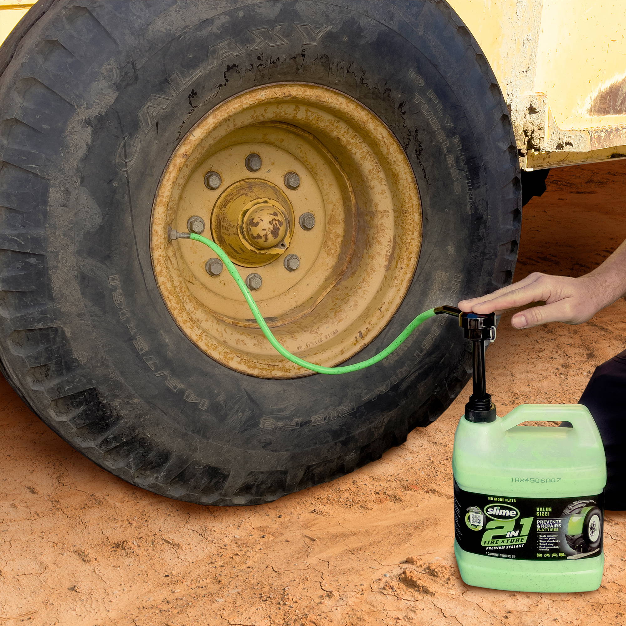 Install Slime 2-in-1 Tire & Tube Sealant into Tractor Tire