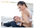 Women nursing her newborn