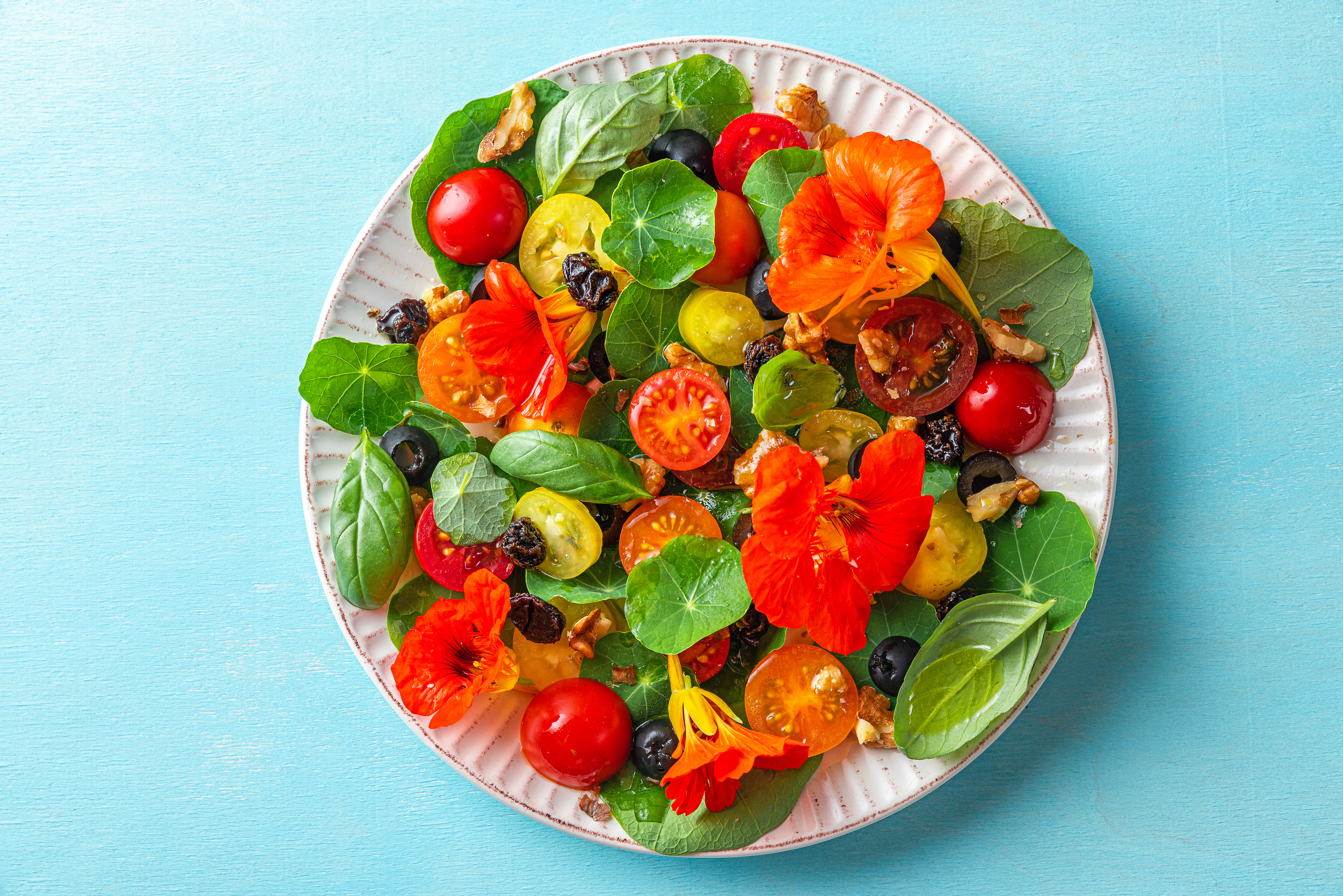 A colorful salad with nasturtiums
