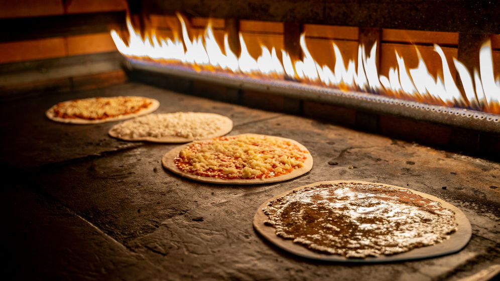 Lebanese food Manakish and pizza baked in the oven oven — Photo
