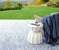 blue indoor outdoor rug on patio