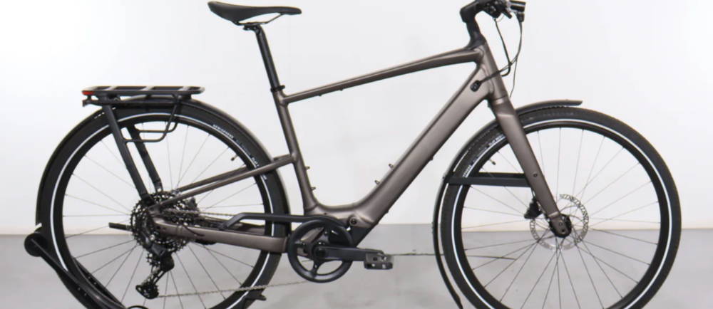 a silver Specialized Turbo Vado SL 2 4.0 EQ electric gravel bike