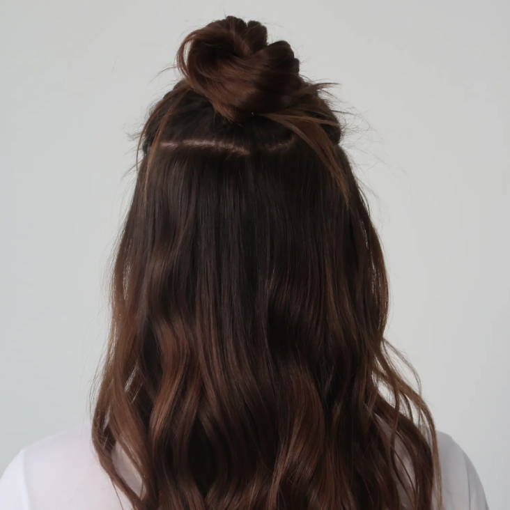 half-up bun on long hair