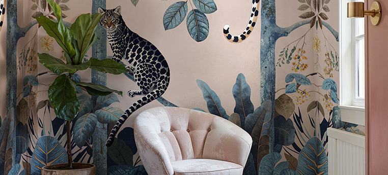 pink tropical leopard wallpaper with a pink chair and a green plant