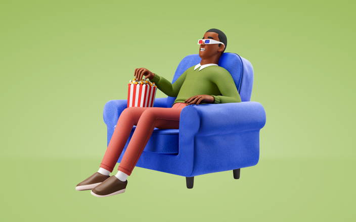 Man wearing 3D glasses and eating popcorn in an arm chair for Confetti's History of Black Cinema Class (Preview)