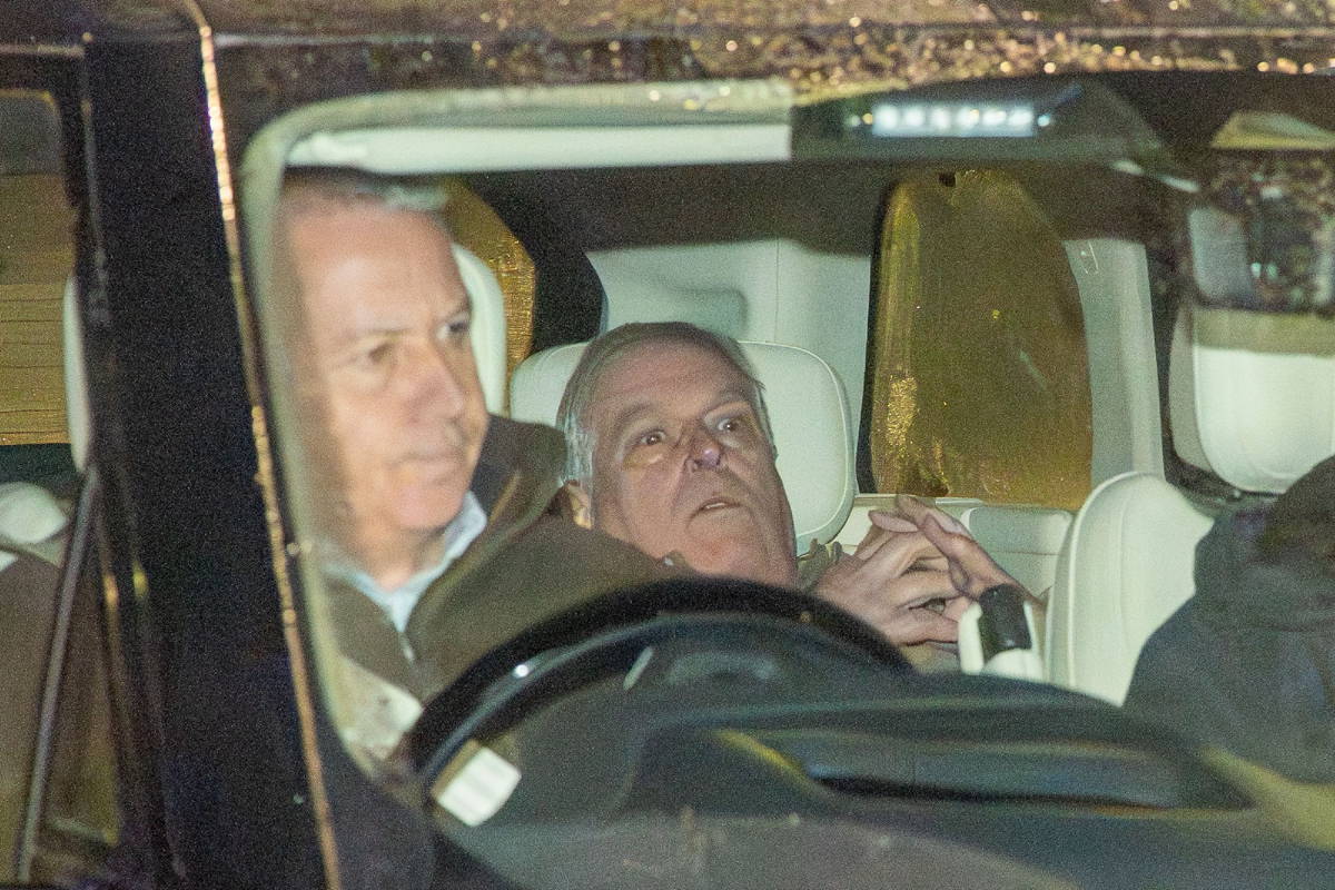 Image may contain: Prince Andrew, Duke of York, Person, Driving, Transportation, Vehicle, Face, Head, and Adult