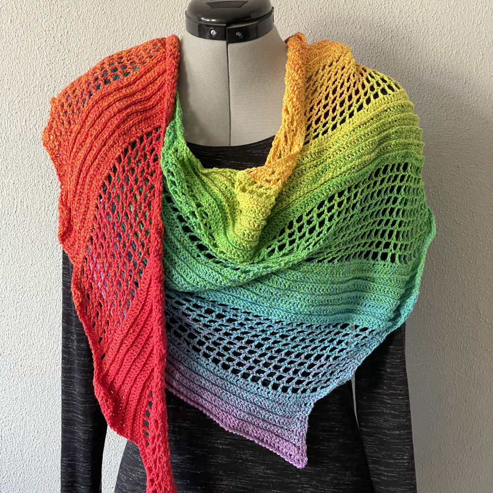 Crocheted rainbow dragon scarf