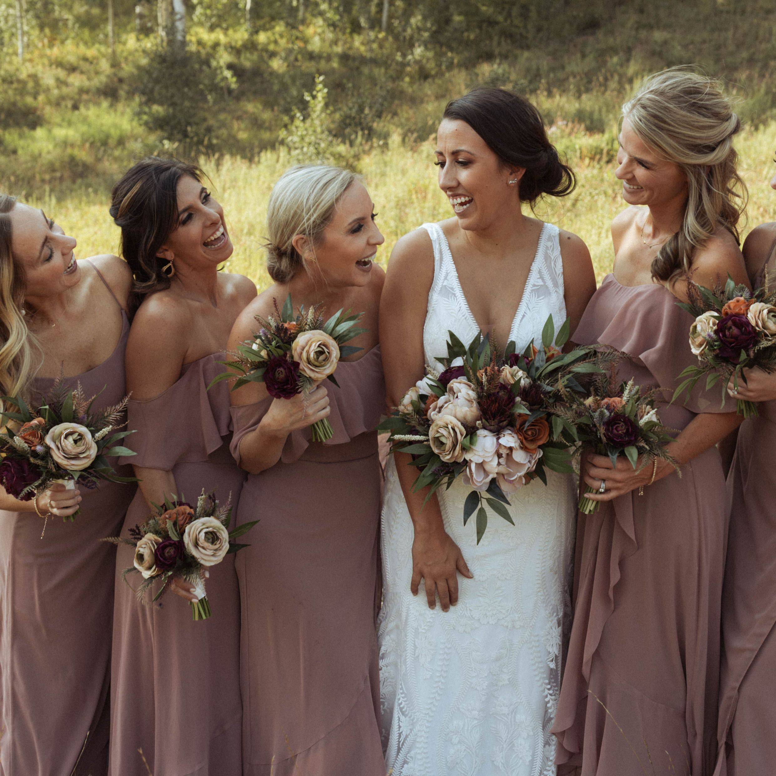 moody fall bridal and bridesmaids bouquets with burgundy, terracotta, and greenery for Denver wedding 