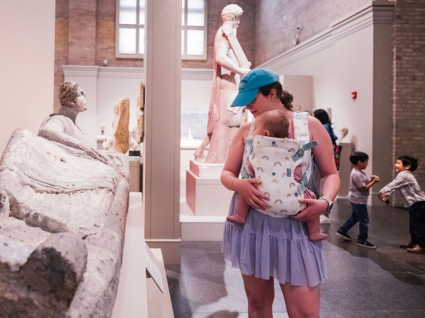 Mom holding baby in Roman gallery