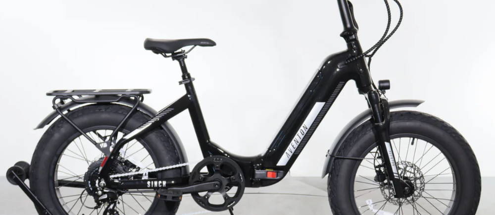 a black Aventon Sinch.2.5 electric folding bike