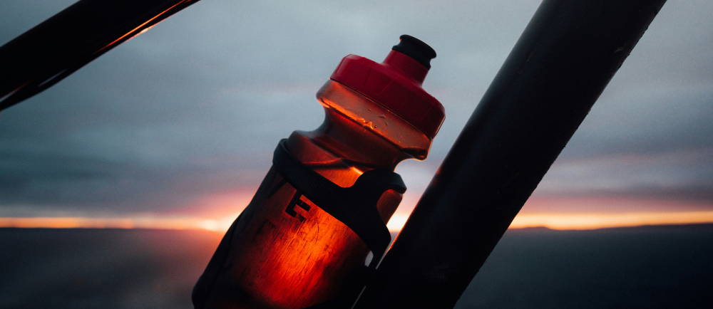 Close up of water bottle in bike frame