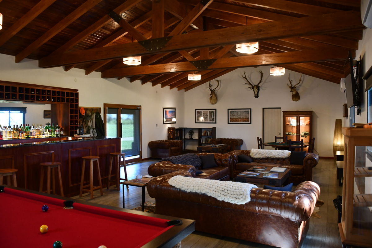 The arched entrance and gardens of the Estancia Las Palomas lodge