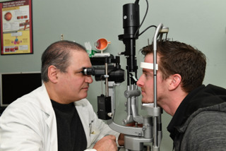 Dr. Christoforidis Examining Patient