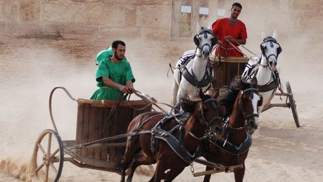 Chariot driver Jordanian men dress as Roman warrior soldiers